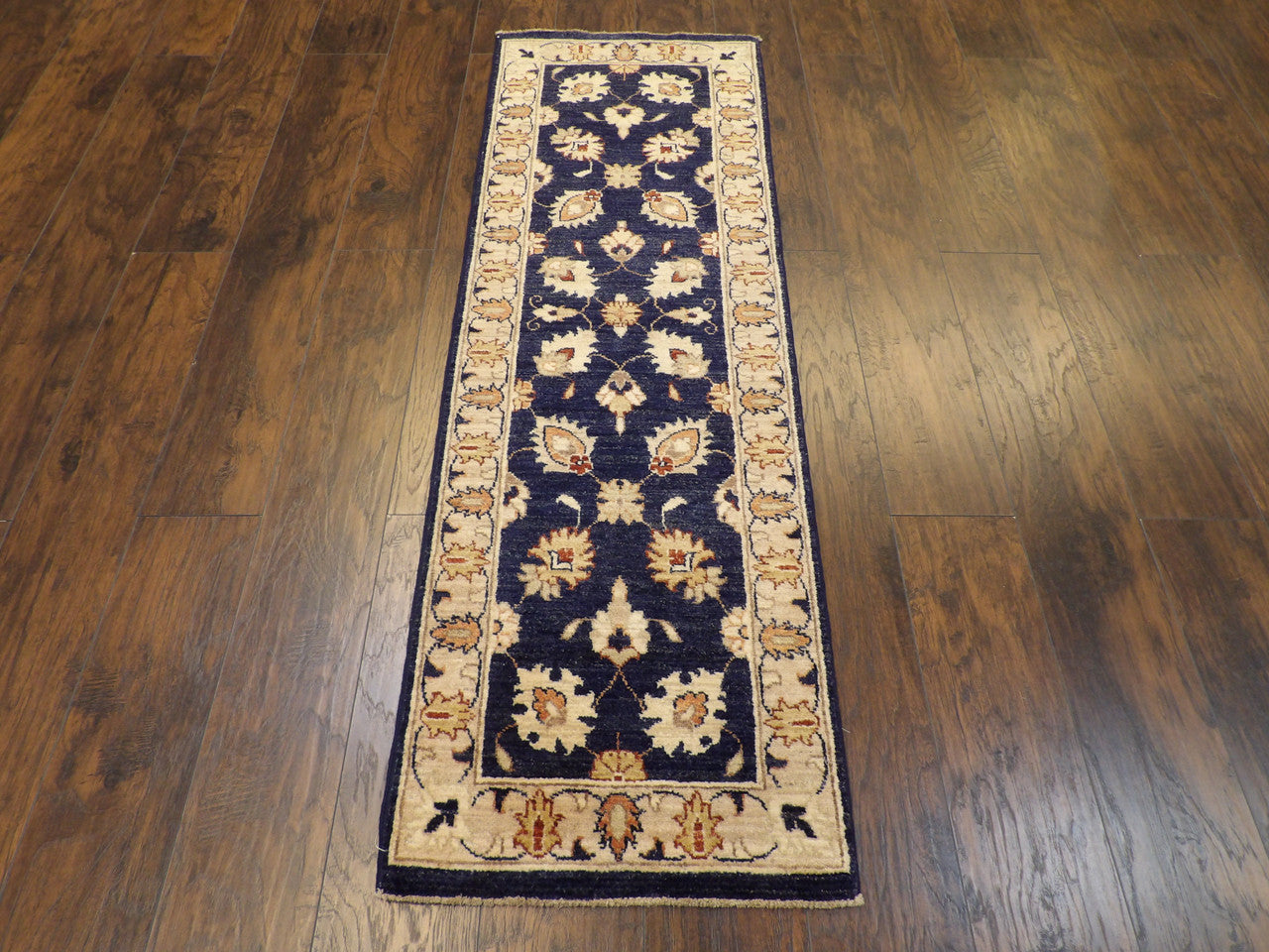 Back of hand-knotted Oushak runner showing construction