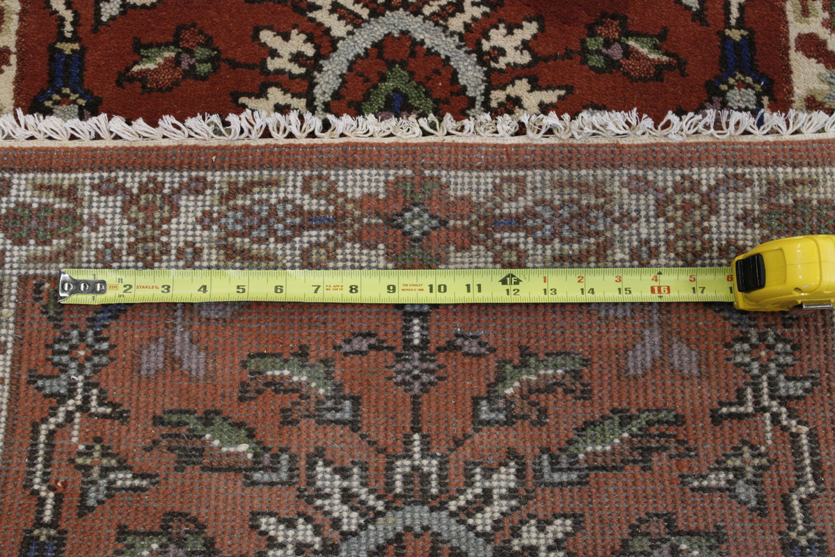 Back of Tribal Heriz hand-knotted rug