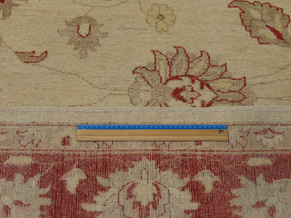 Beige & Red Oushak Chobi Natural Dye rug in room setting