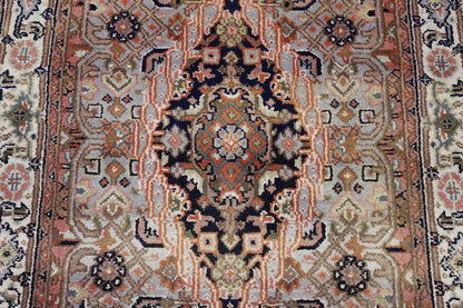 Traditional Indo Tabriz rug corner detail