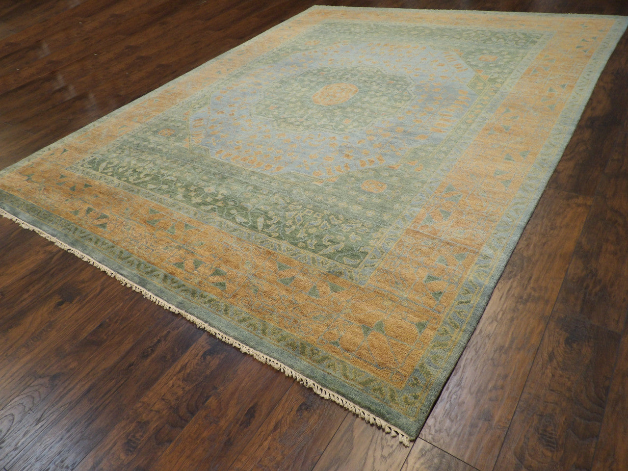 Close-up of wool pile, Green & Rust rug
