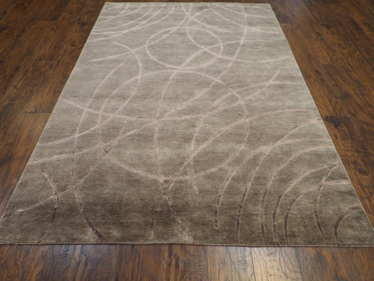 High-low pile pattern detail, gray rug