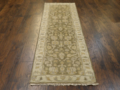 Back of hand-knotted Oushak runner showing construction