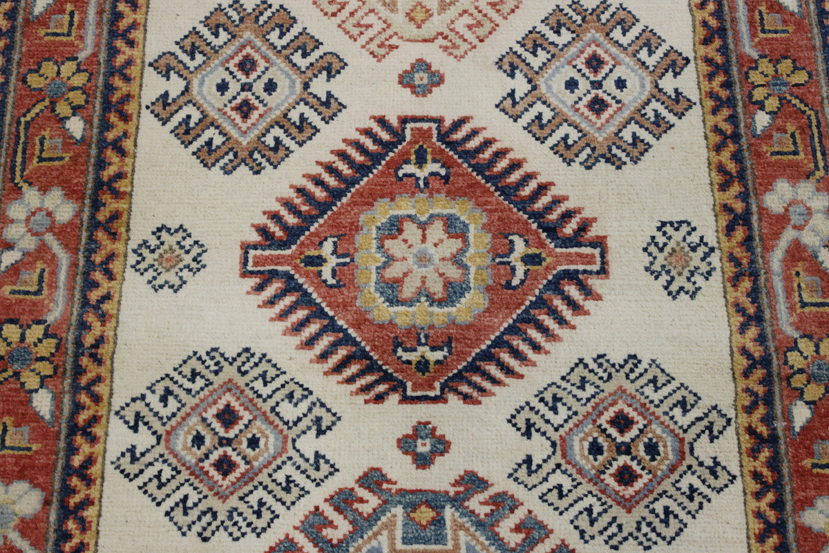 Tribal Super Kazak rug corner detail