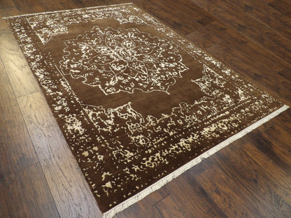 Brown and gold Broken Heriz rug in a living room setting