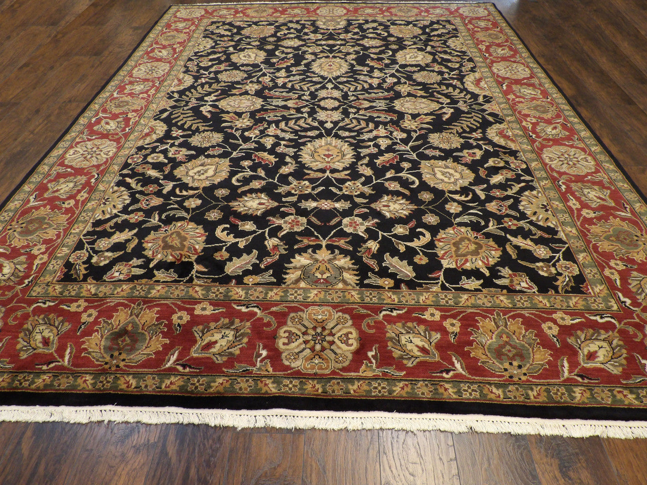 Close-up of wool pile, black and red rug