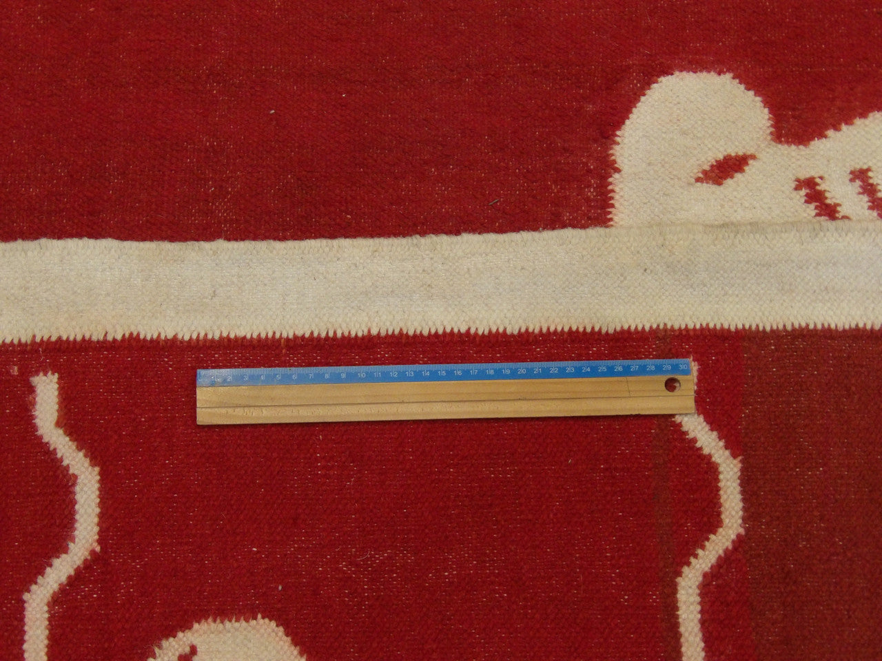 Beige & Red Coastal Indoor/Outdoor Beach rug in room setting