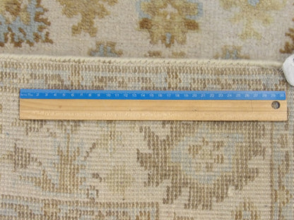 Ivory Oushak rug in room setting