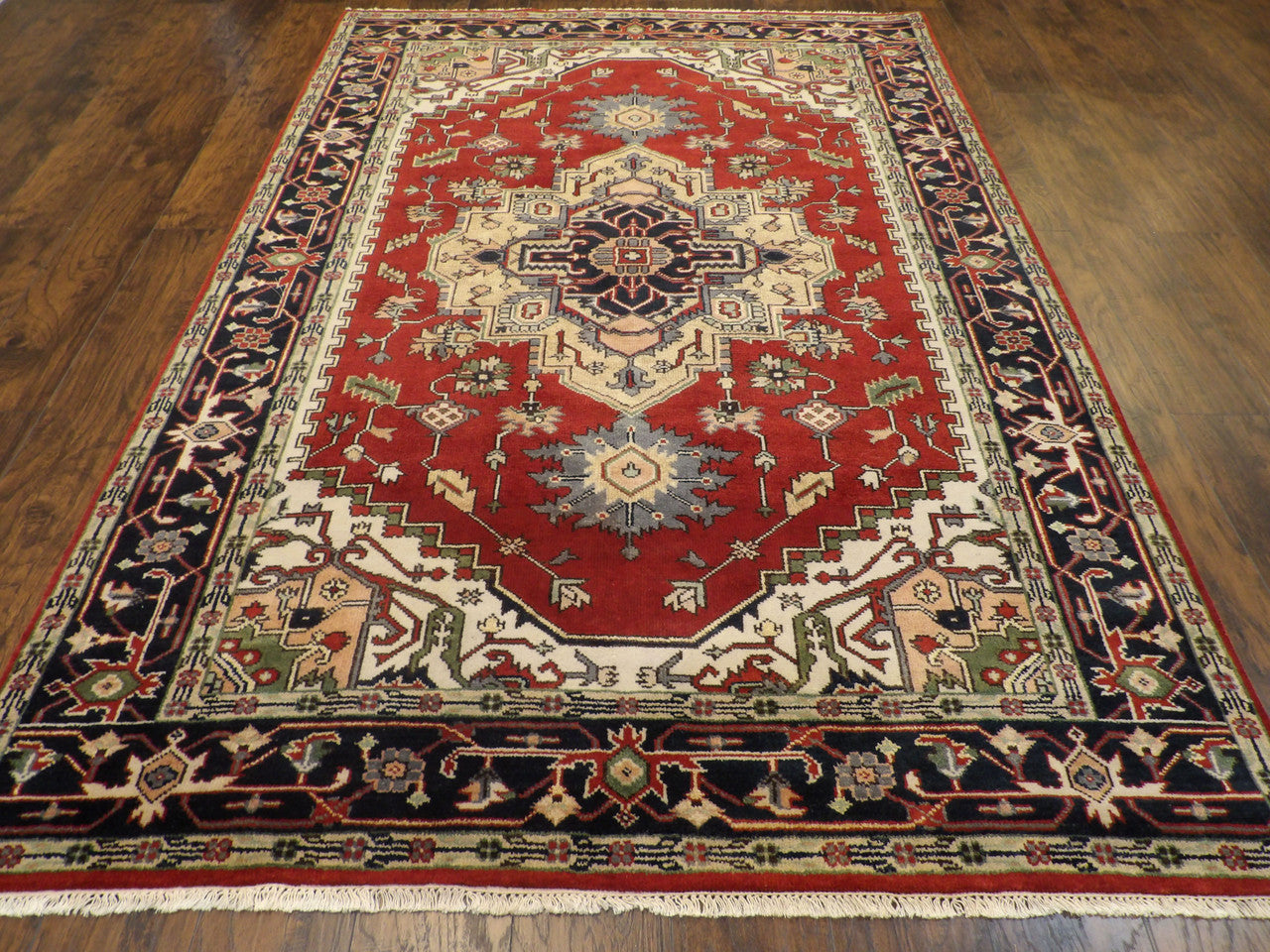 Tribal Heriz rug corner detail