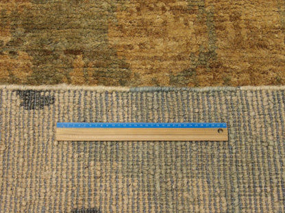 Gold and green Ikat rug in room setting