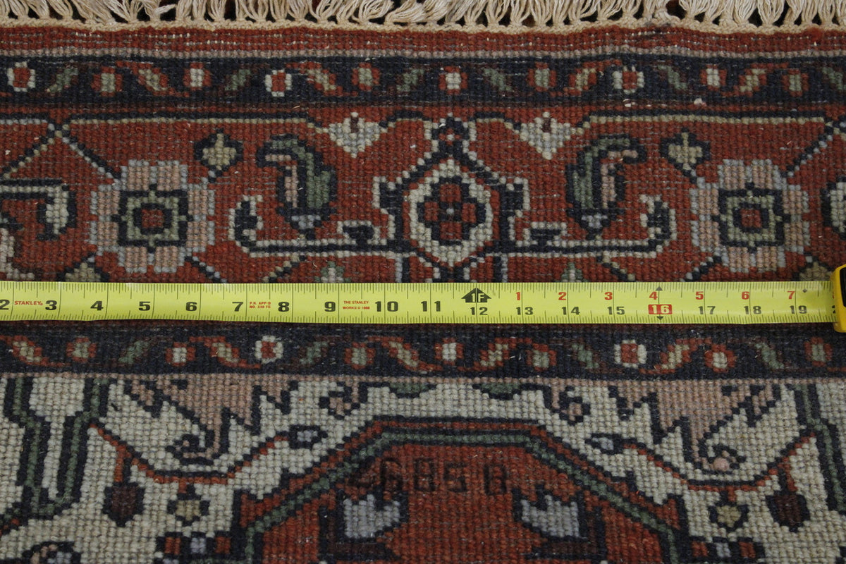Back of Tribal Heriz hand-knotted rug