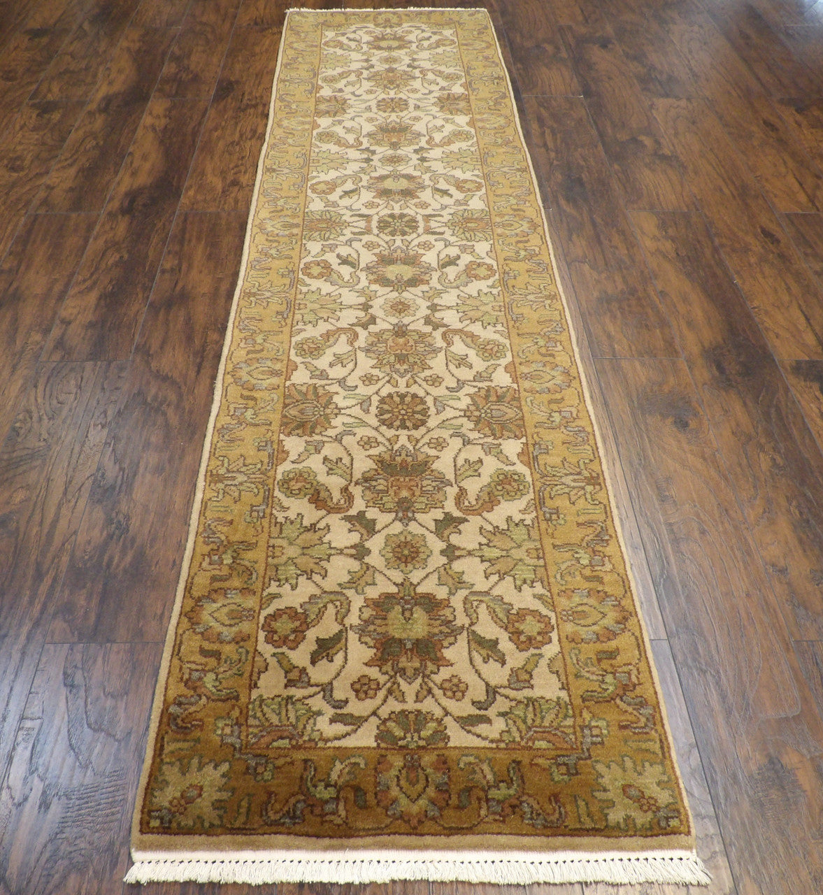 Close-up of wool pile, gold and beige runner