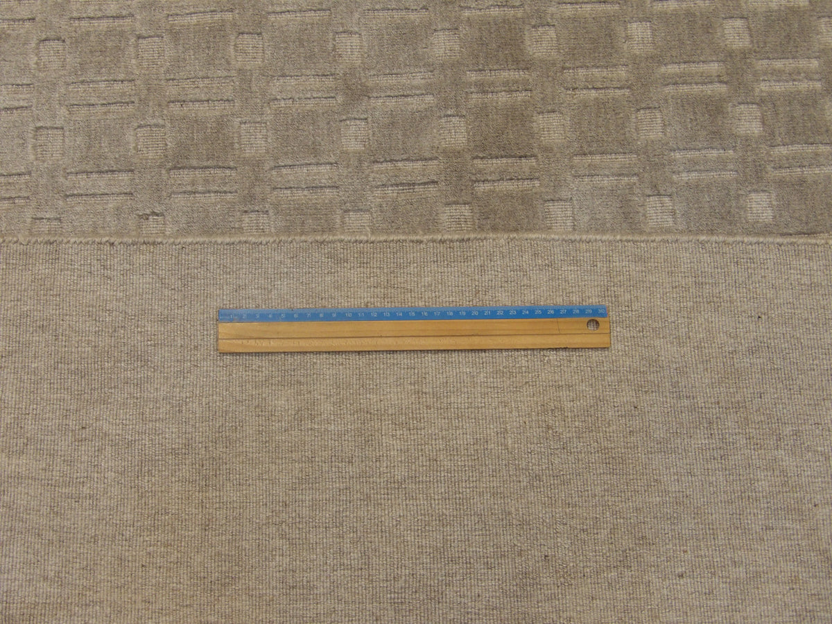 Gray plain modern rug in room setting