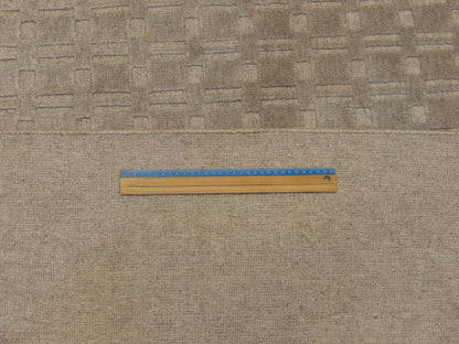 Gray plain modern rug in room setting