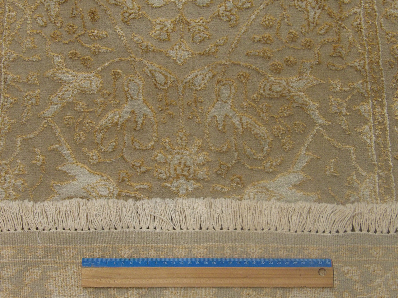 Beige Persian Kashan Carved rug in room setting