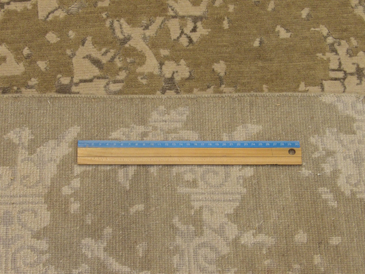 Full room view of transitional broken damask hand-knotted rug