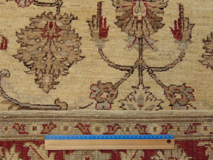 Beige & Red Chobi Oushak rug in room setting