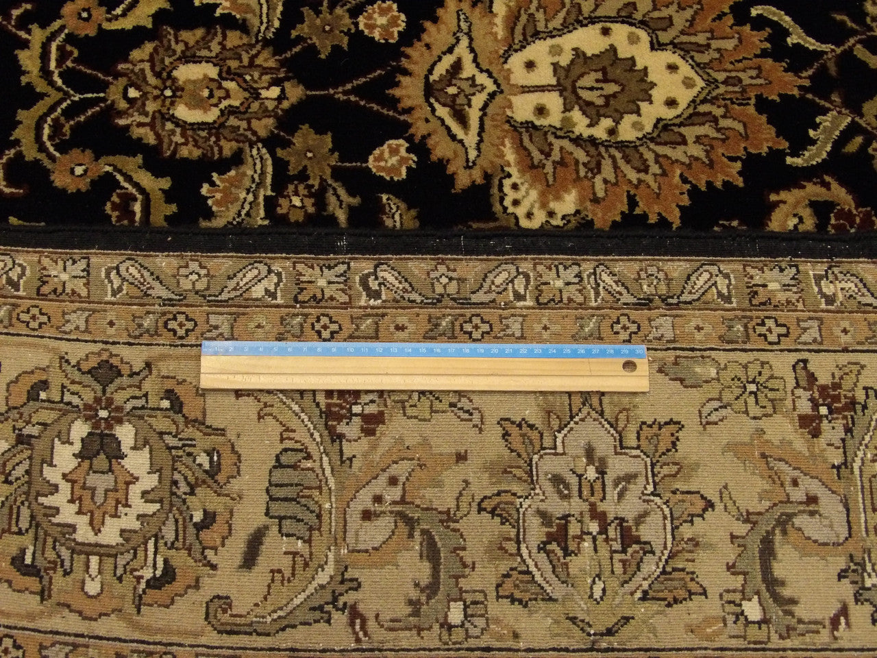 Black & Gold Fine Persian Kashan rug in room setting