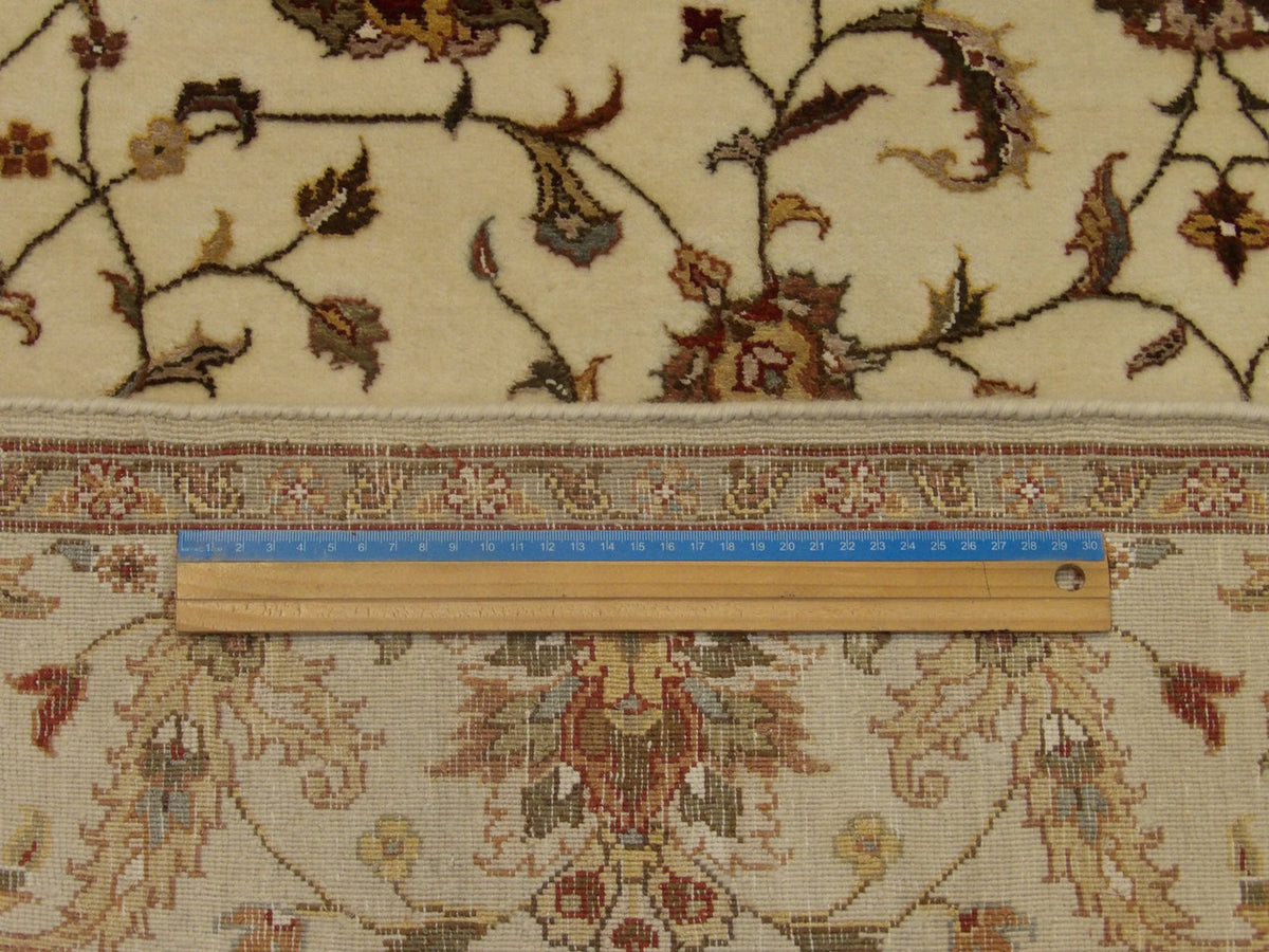 Ivory Kashan rug in room setting