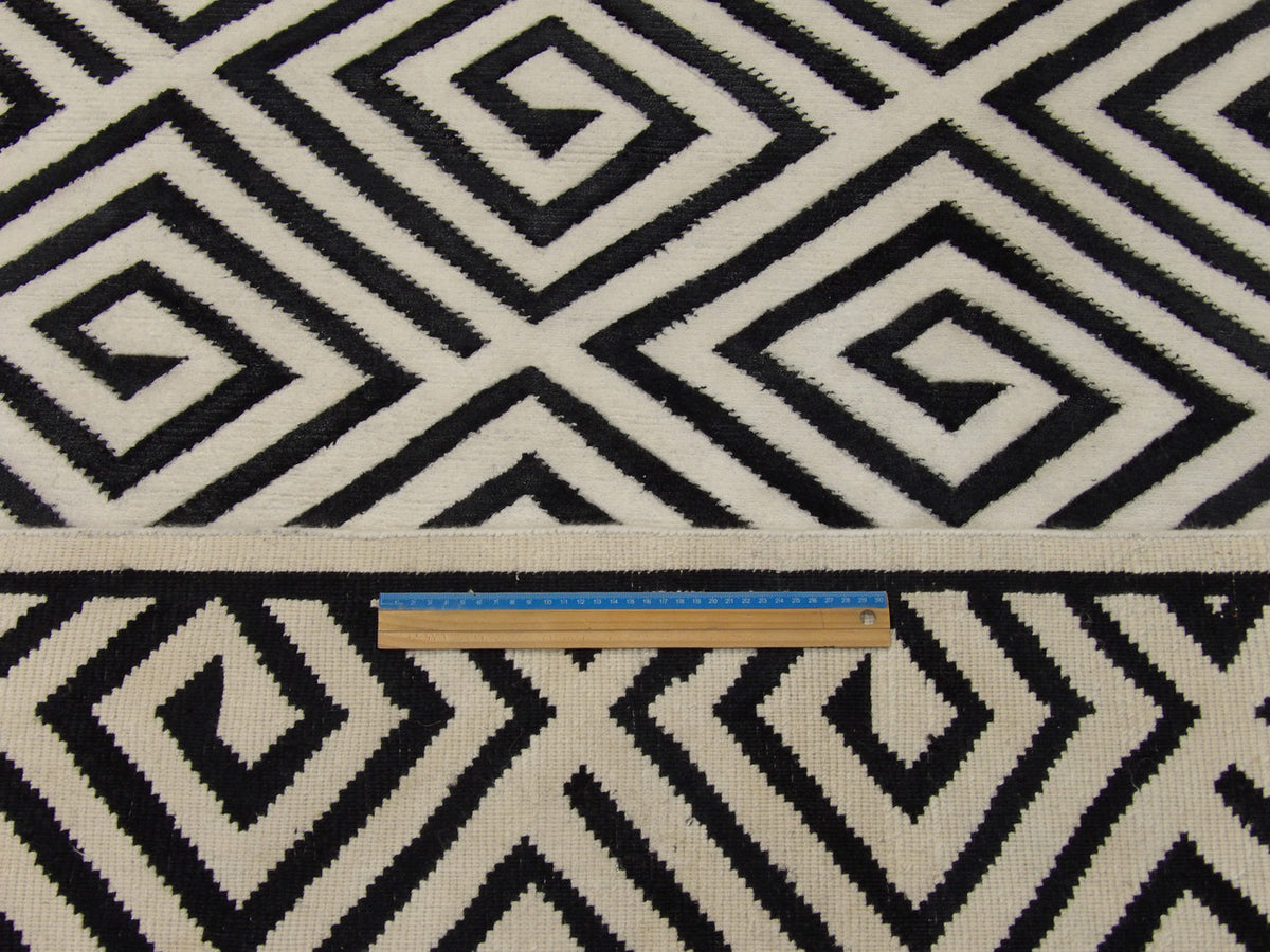 Black and white Tibetan rug in room setting