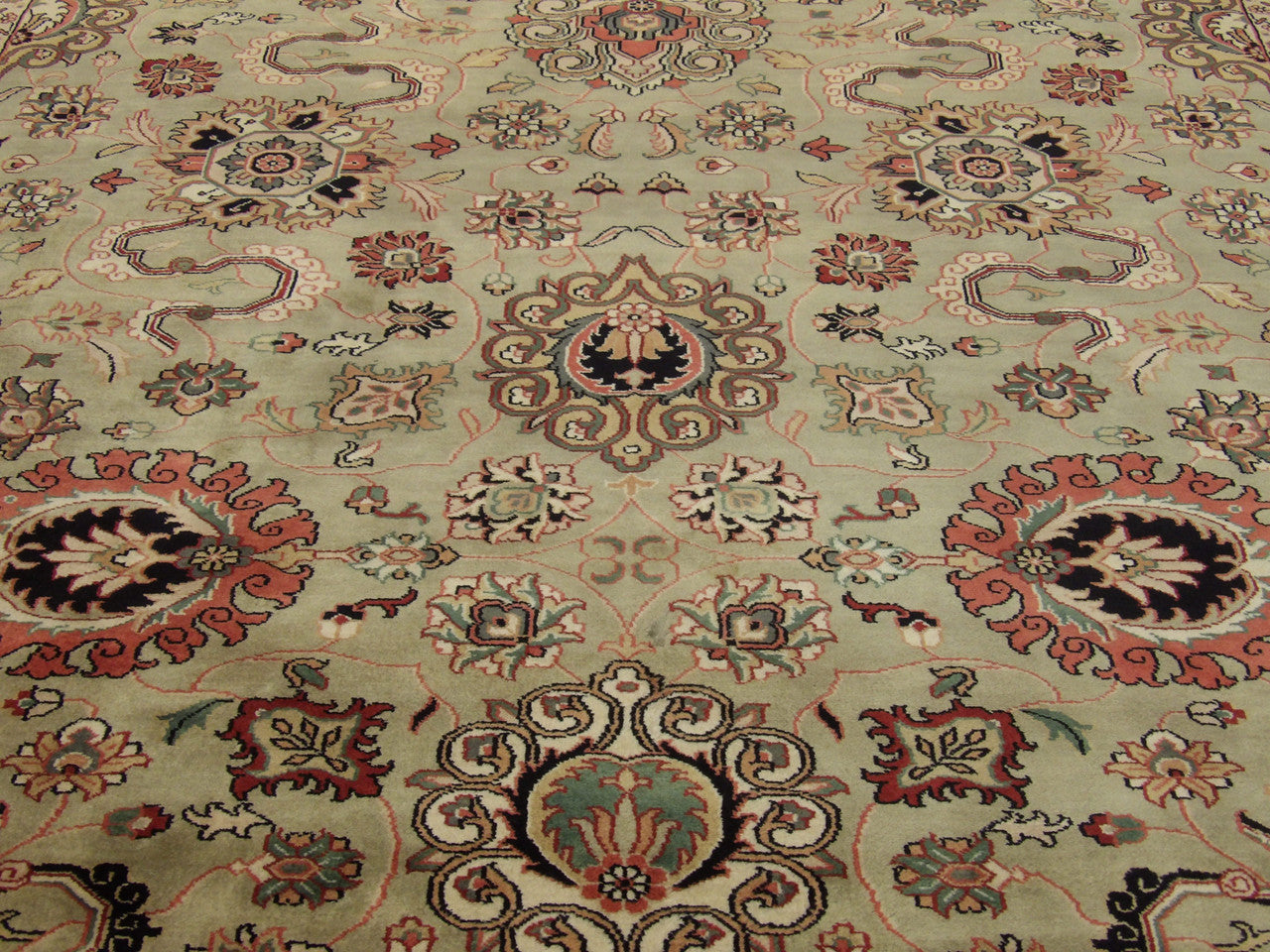 Back of Persian Mashad hand-knotted rug