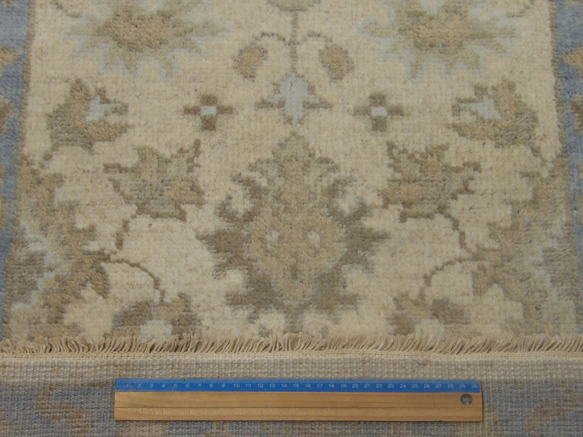 Blue & Beige Turk Oushak Stone Wash rug in room setting