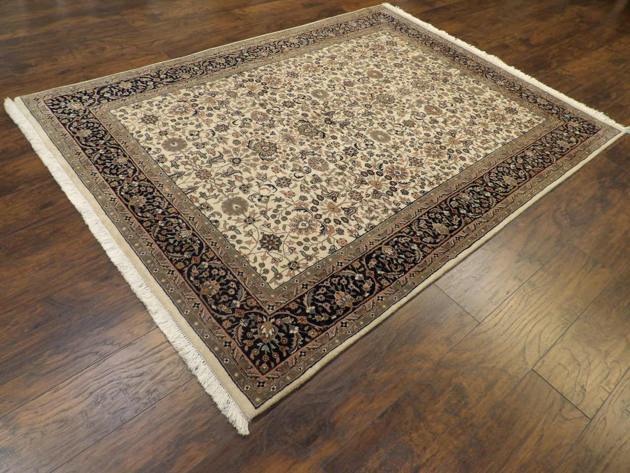 Blue Persian Kashan rug in a room setting