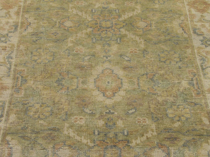 Wool texture close-up, beige and green Oushak runner