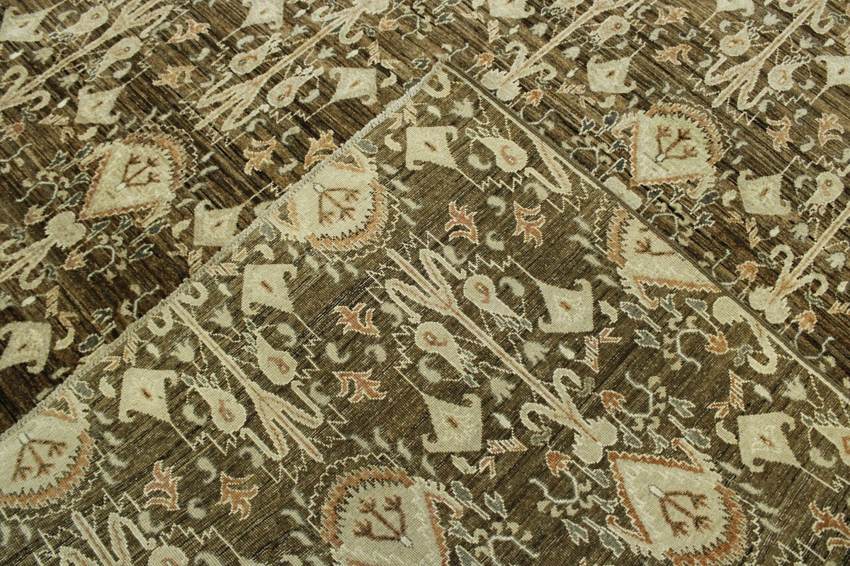 Brown & Gold Tribal Vegetable Dye Ikat rug in room setting