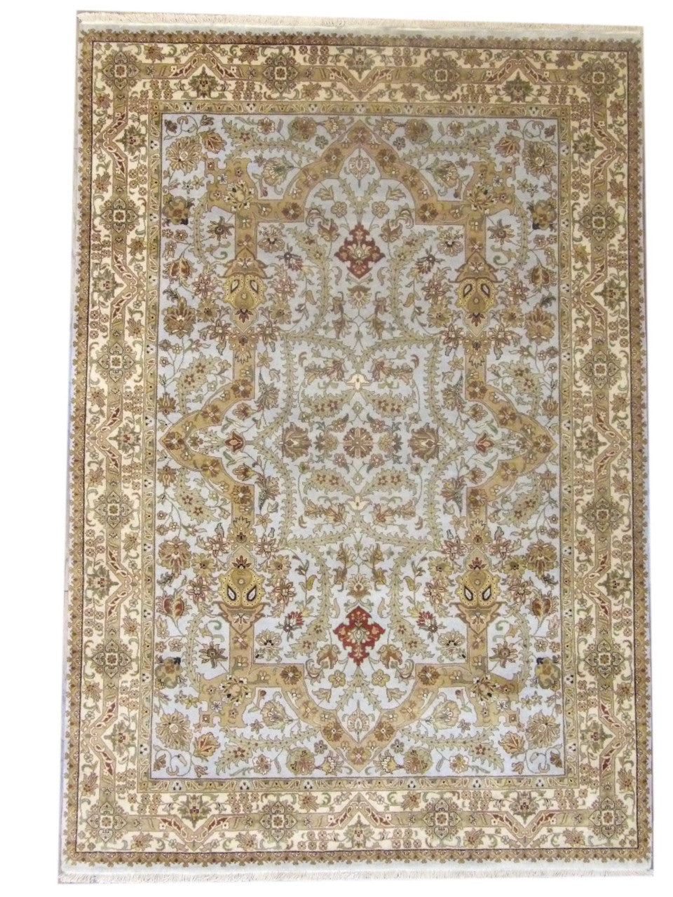 Fine Persian Haji Jalili hand-knotted wool rug in blue and gold, full view