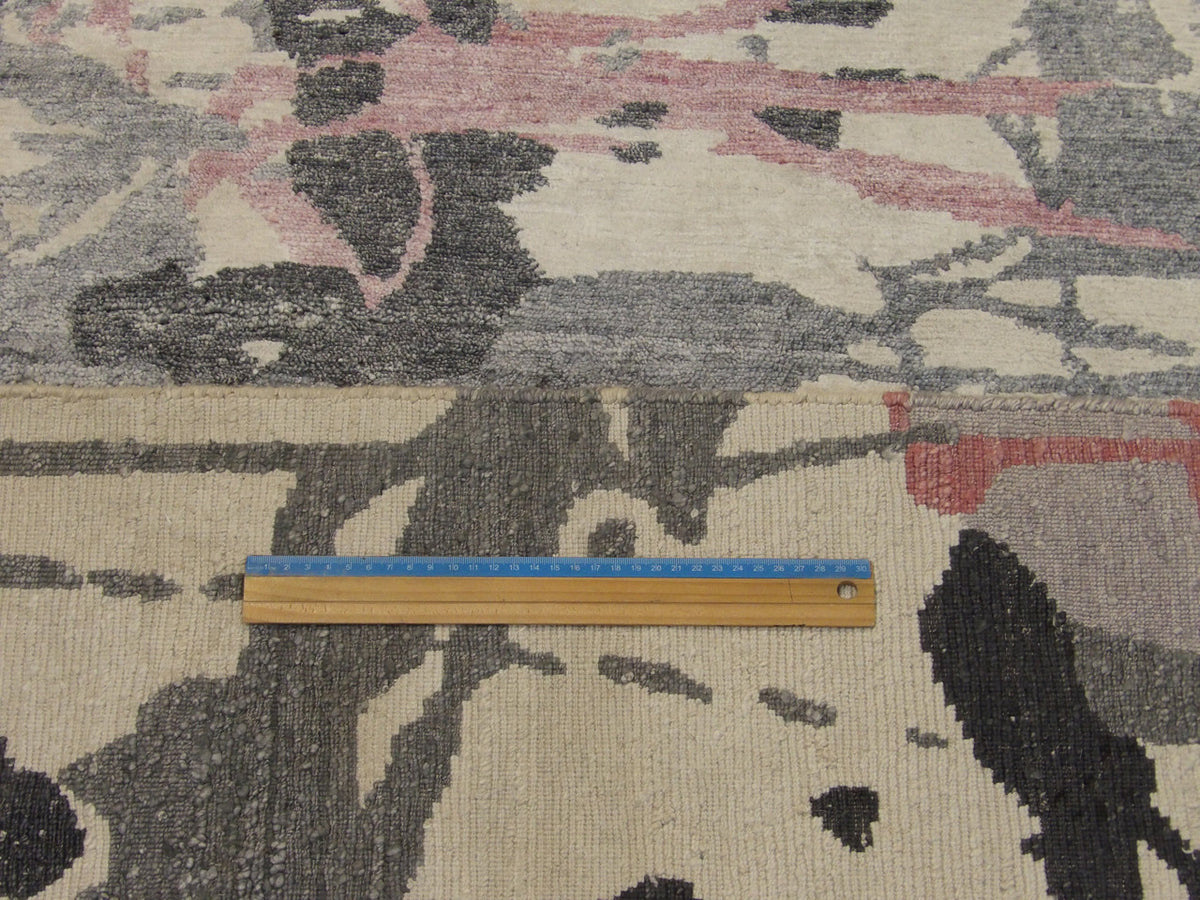 Gray & Pink Modern Oxidized Abstract Design rug in room setting