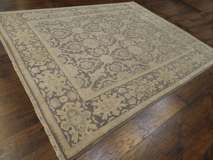 Gray and beige Oushak rug in a living room setting