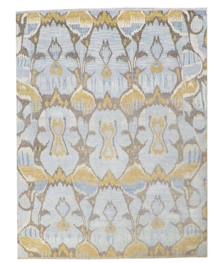 Transitional Ikat design hand-knotted wool rug in brown and gold, full view