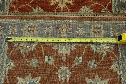 Rust Traditional Indo Ziegler Chobi rug in room setting