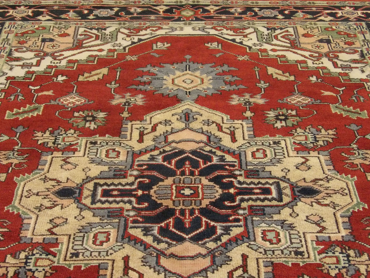 Back of Tribal Heriz hand-knotted rug