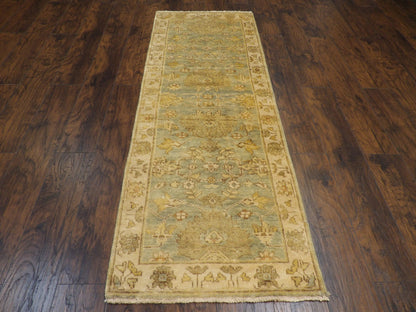 Close-up of wool pile, Green & Beige rug