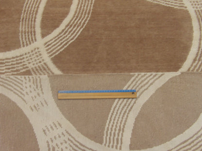 Beige & Purple Modern Nepalese Circle Design rug in room setting