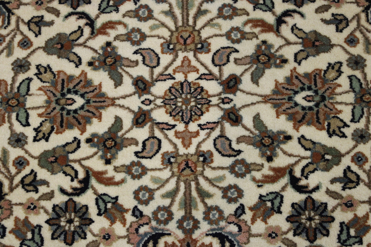 Traditional Fine Mashad rug corner detail
