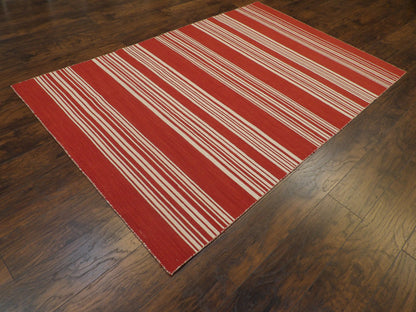 Flatweave pattern detail, beige and red coastal rug