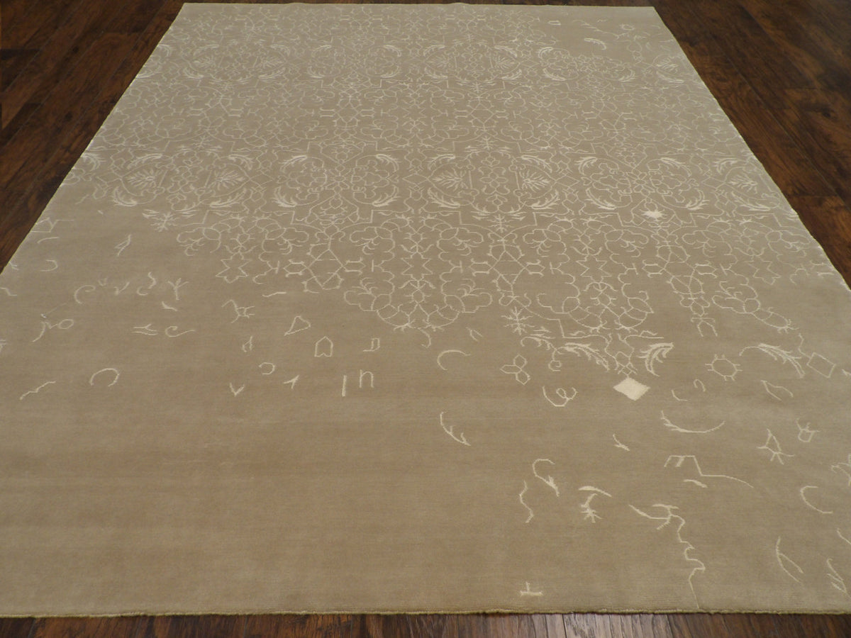 Broken pattern detail, gray and beige rug