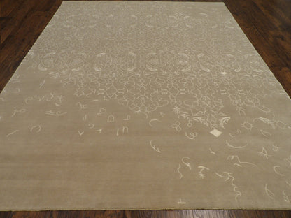 Broken pattern detail, gray and beige rug