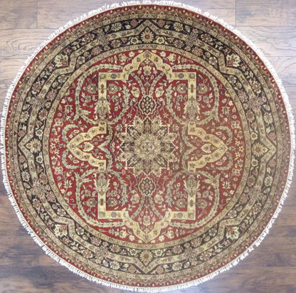 Persian Tabriz hand-knotted wool rug in black and red, round, full view