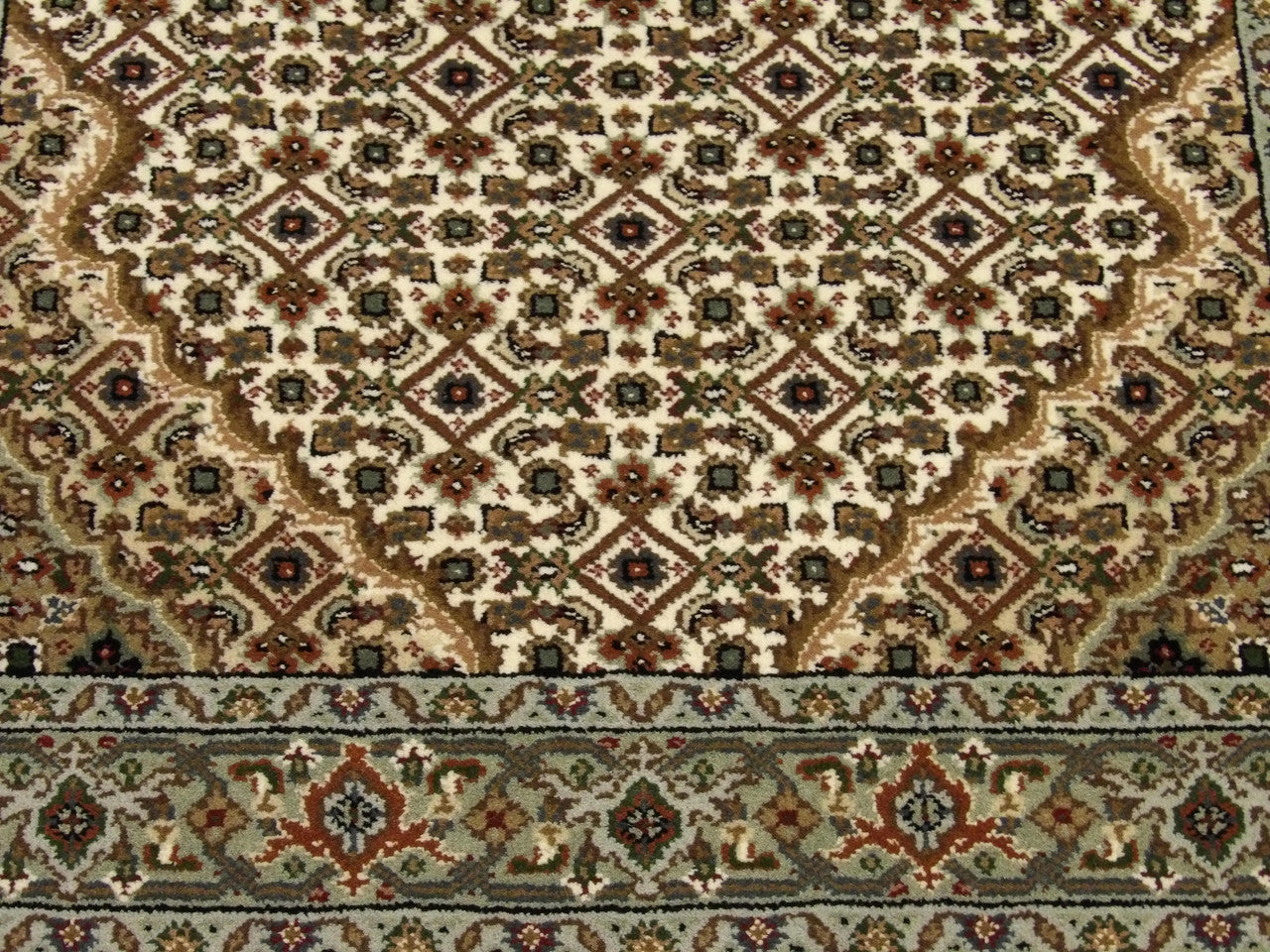 Fine Persian Tabriz rug border detail