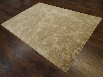 Beige and gray broken damask rug in a living room setting
