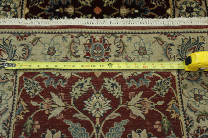 Red Traditional Fine Herati rug in room setting