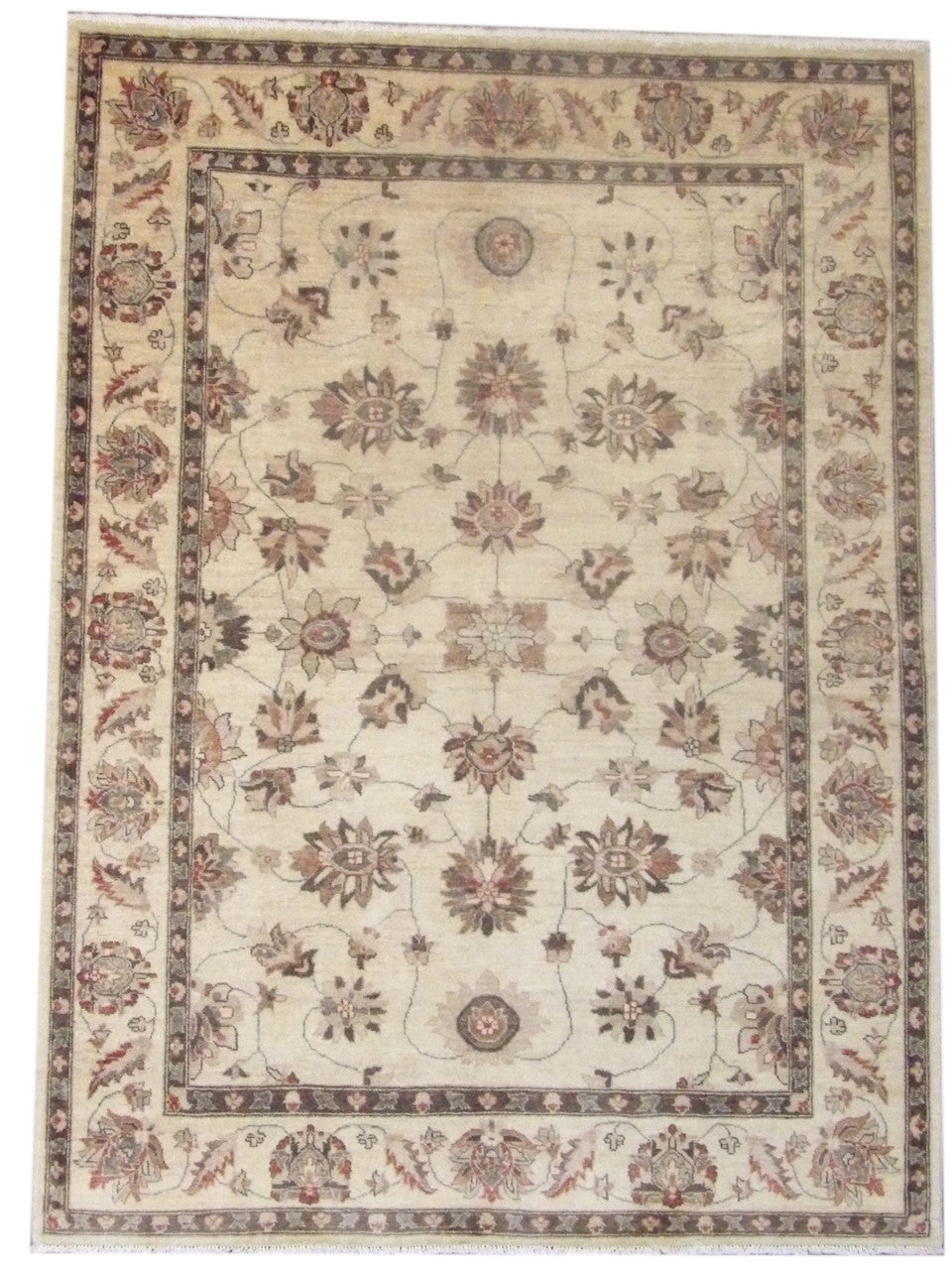 Oushak Chobi hand-knotted wool rug in brown and beige, full view