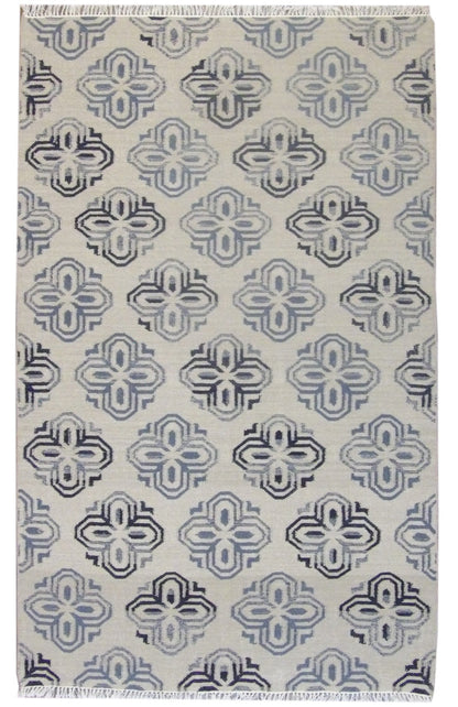 Coastal flat weave hand-knotted wool rug in gold and ivory, full view