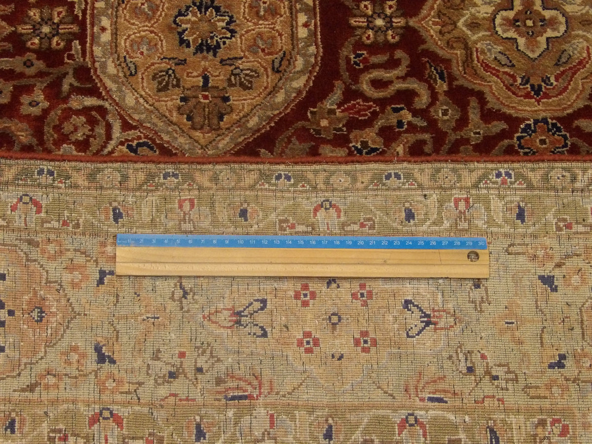 Beige & Rust Fine Persian Silky Haji Jalili rug in room setting