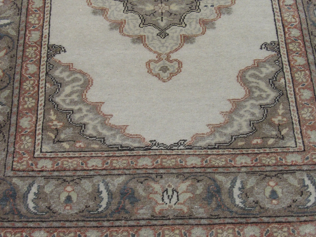 Back of hand-knotted antique Oushak rug showing construction