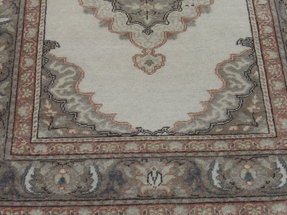 Back of hand-knotted antique Oushak rug showing construction